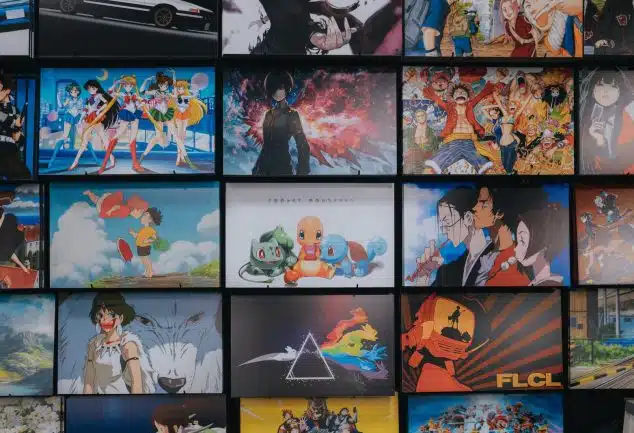 anime character collage photo on black wooden shelf